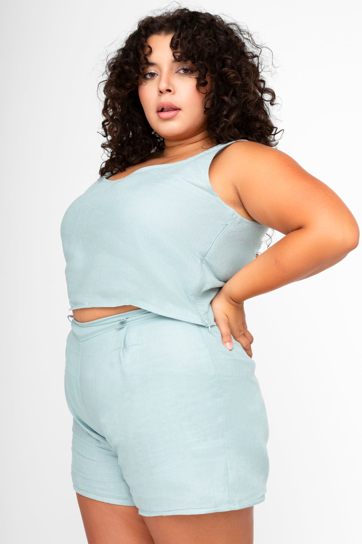 Blue linen tank top paired with a blue linen shorts for plus sized or extended sizing.