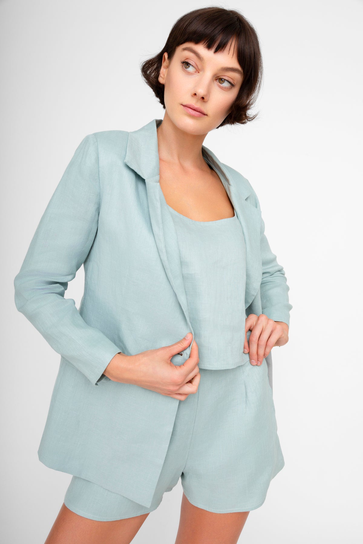 A soft, linen blazer in sea salt blue.